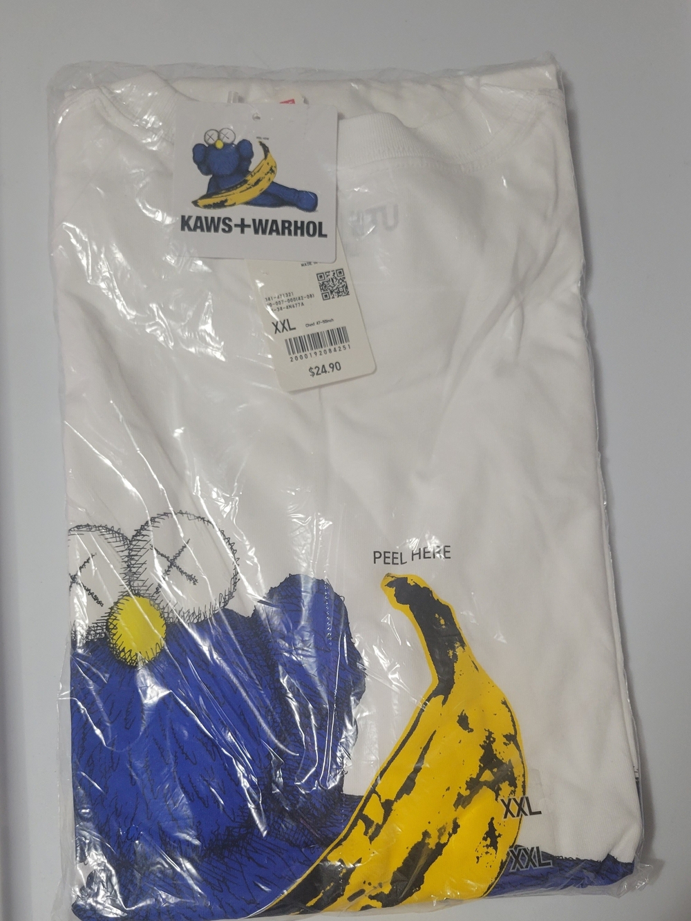 Uniqlo x KAWS White T-Shirt with Blue & Yellow Graphic